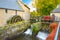 The water mill on the River Aure in the medieval town of Bayeux on the Normandy Coast of France, with autumn colors