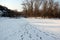 The water mirror is covered with ice of the Dnieper River near the Khortitsa Island in the frosty winter. city of Zaporozhye. Ukra