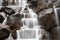 Water in motion at manmade waterfall