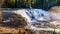 Water of the Murtle River as it tumbles over the cusp of Dawson Falls in Wells Gray Provincial Park