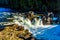 Water of the Murtle River tumbles over the edge of Whirlpool falls in the Cariboo Mountains of Wells Gray Provincial Park