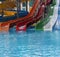 Water park. Blue pool slide swimming. Aquapark