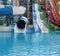 Water park. Blue pool slide swimming. Aquapark