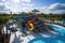 water park with numerous slides, including speedy water slide and gentle river ride