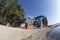 Water park and pine trees on sand beach in Crikvenica