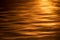 Water pattern in red sunset, nature detail background with waves