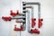 Water pipes with red valves