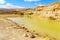 Water pond and landscape in Makhtesh crater Ramon