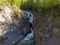 The water of the putna waterfall seeps among the rocks