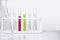 Water quality monitoring in chemical laboratories. The red chemical in the test tube has a high PH ranges value Acids Strength.