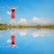 Water Reflection Happy Woman Jumping with blue sky