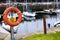 Water safety life deep risk danger red orange buoy ring save swimmer dock harbour harbor coastal sea marina