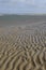 Water and sand on beach, netherlands