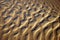 Water-smoothed sand pattern