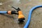 Water spay gun and pipe on wet ground, Washing tool