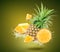 Water Splash On fresh pineapple With Leaves Isolated On Green Background