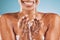Water splash, hands and black woman with wellness, skincare and smile. Wet, liquid drops and young female with body care