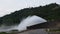 Water splashing from floodgate Khun Dan Prakarn Chon huge concrete dam in Thailand