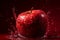 Water splashing on Fresh Red apple on red background2