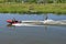 Water sports in summer water skiing on surfboard