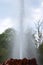 Water spraying as a geyser erupts