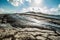 Water spring bursting from muddy volcanoes