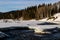 Water starting to peak through the river in late winter. Allan Bull Provincial Recreation Area. Alberta Canada
