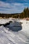 Water starting to peak through the river in late winter. Allan Bull Provincial Recreation Area. Alberta Canada