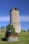 Water stock tank and and an old silo