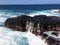 Water Stream Entering Pacific Ocean near Queen`s Bath in Princeville on Kauai Island, Hawaii.