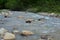 Water stream, mountain river, boulders