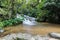 Water in stream is small waterfall.