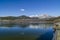 Water streams, rocks, trees and beatiful sky. Navacerrada reservoir