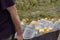 Water supply shortage and climate change threats. White male pulls a cart of plastic bottles filled with clean water from a public