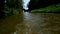 Water swirling behind skiff boat with small engine on Bata Channel in Moravia, Czech Republic