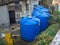 Water tanks in the backyard. Water tanks next to the hotel. Huge plastic tanks