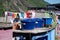 Water tanks on the roof of a house in a favela on the hillside of a steep hill on the outskirts of Rio de Janeiro