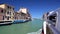 Water taxi bus carrying tourists along Grand Canal, leisure trip around Venice