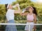 Water, tennis women hydrate and fitness workout with training coach relax on tennis court. Team health, success sports