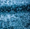 Water texture abstract background, aqua drops on blue glass as science macro element, rainy weather and nature surface art