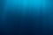 Water texture in underwater and sun rays. Blue ocean in underwater