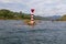 Water transport, river buoy in the center of the river