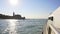 Water transport in Venice, view from the boat on Grand Canal, sun reflections