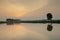 Water and Tree reflections during Sunset near paddy fileds of Kotpad,Odisha,India