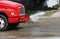 Water truck cleaning street