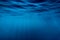 Water underwater and sun rays. Blue ocean in underwater