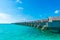 Water villas over calm sea in tropical Maldives island .