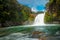 Water from volcano Mt Ruapehu forms Tawhai Falls in Tongariro National Park, New Zealand