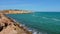 Water waves on cape of shore Mediterranean sea in Monastir city, Tunisia.