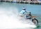 WaterBike ride by Robbie Maddison Australian stunt rider, the image shows how to ride his dirt bike on water in action.